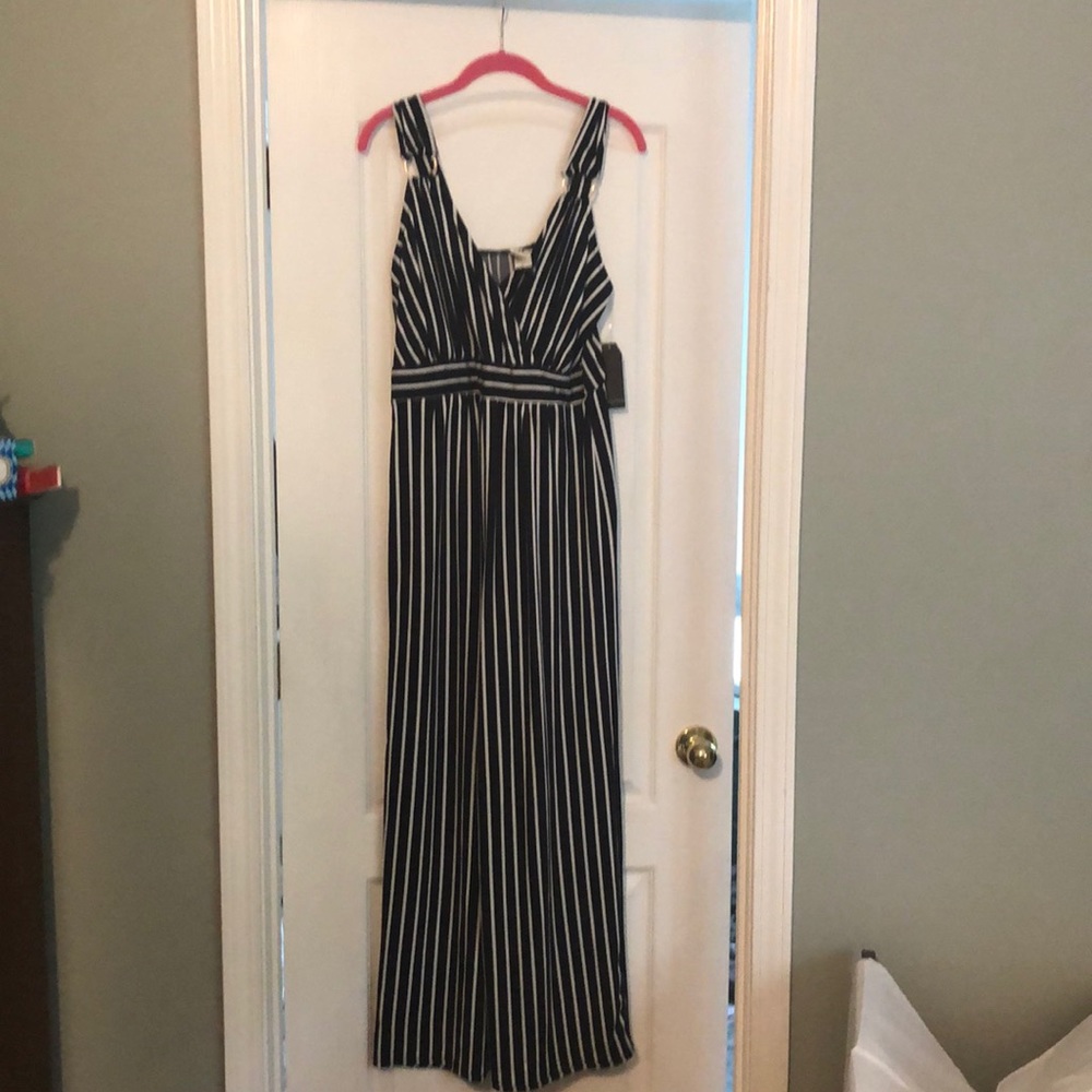 Romper Size large L.  NWT. Wrapper brand.